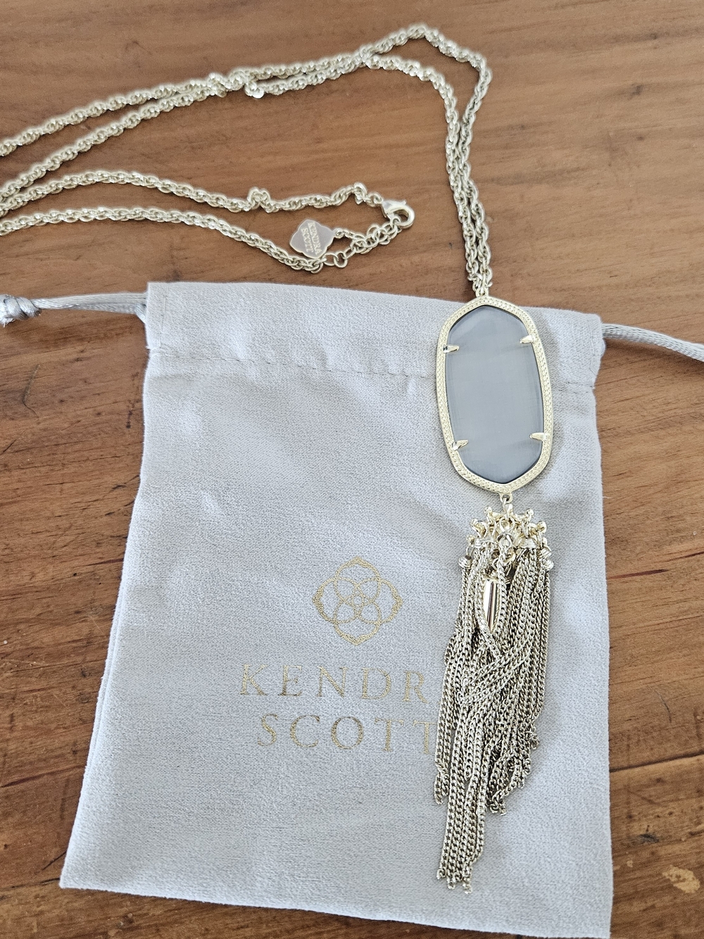 Kendra Scott Gold Tassel Necklace with Light Gray Oval Stone